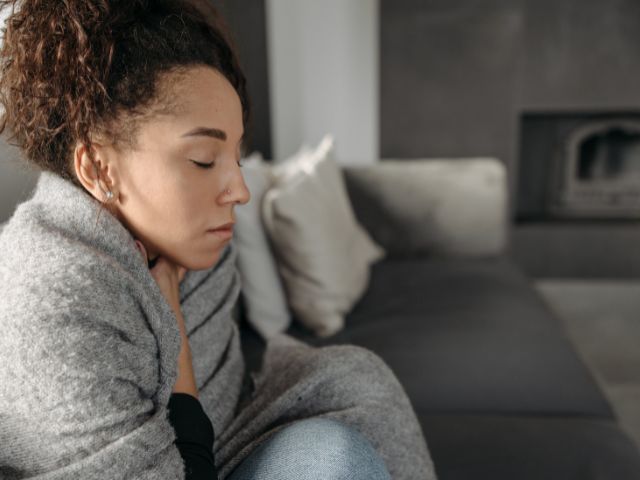 woman in blankets